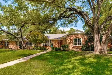 Classic Design Meets Modern Comfort on Landscaped Lot