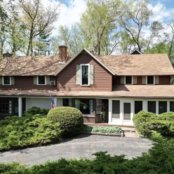 SPACIOUS HOME ON 110 ACRES WITH BARN AND POND