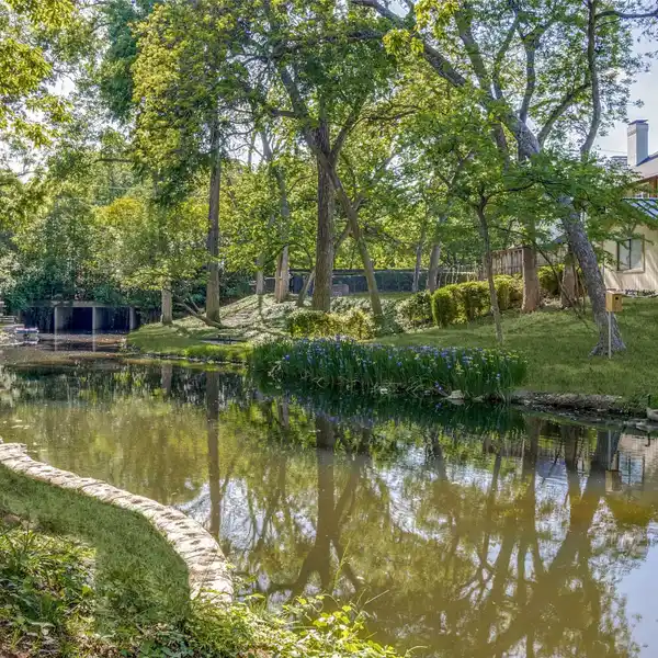 SPECTACULAR PROPERTY WITH 172 FEET OF CREEK WATER FRONTAGE