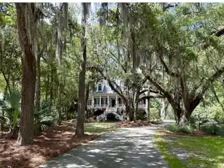 Elegant Living Beneath Moss-Draped Oaks