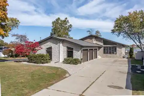 Lakefront Elegance in Exclusive Gated Community