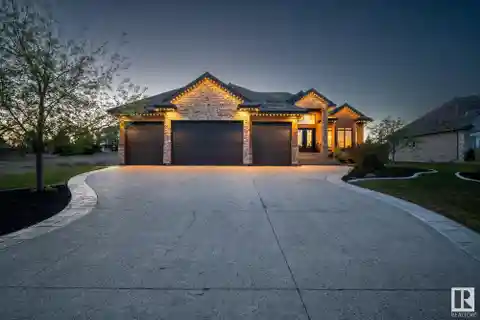 Custom Riverstone Bungalow with Backyard Oasis