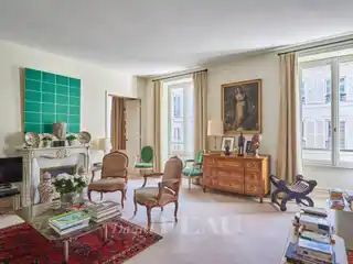 Bright Parisian Apartment with Historic Charm and Potential