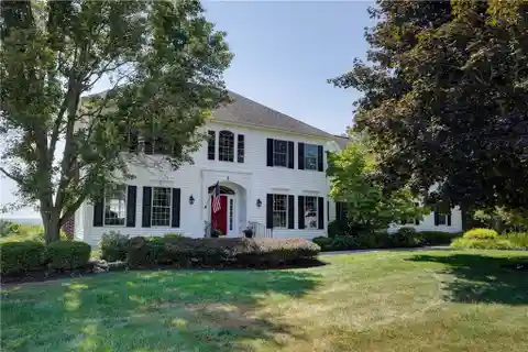 Custom Woodstone Home with Exceptional Upgrades