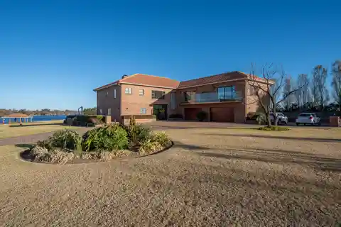 Millionaire Mile Estate with Private Riverfront Bliss