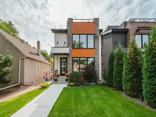 Modern Glenora Home with Striking Glass Accents