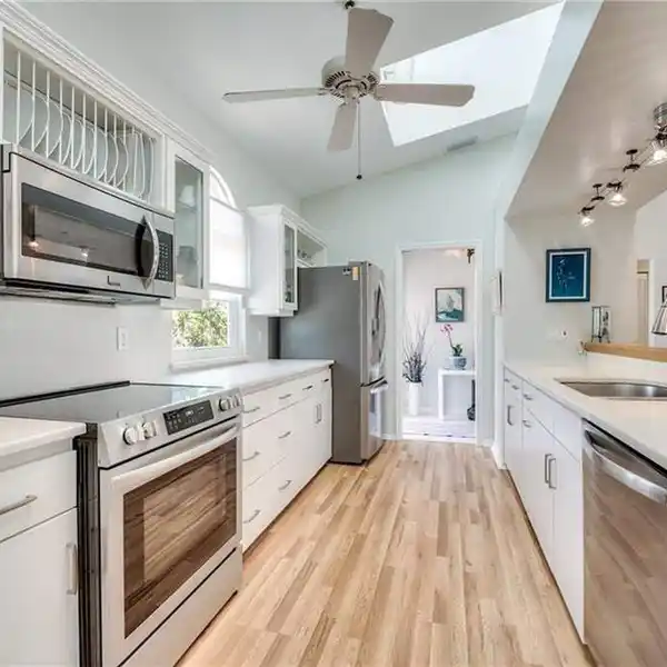 OVER AN ACRE OF NEAR BEACH PARADISE