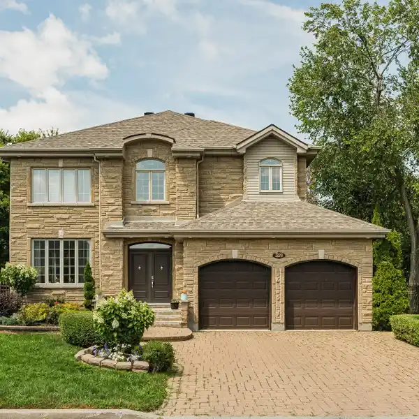 CONTEMPORARY HOME IN A LUSH SETTING