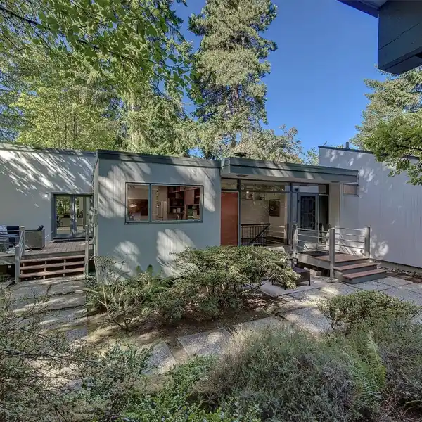 UPDATED CUSTOM-DESIGNED MID-CENTURY HOME
