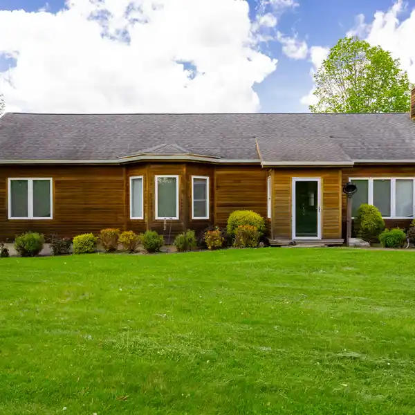 CEDAR-SIDED TRADITIONAL HOME ON 23 ACRES