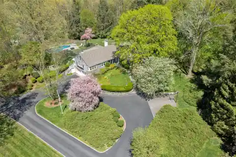Hamptons-esque Cape Cod on Verdant Property