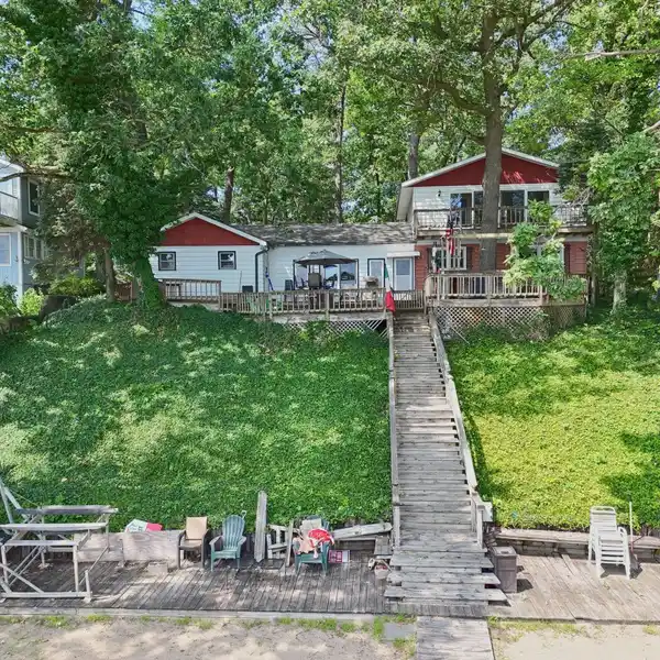 BIG CROOKED LAKEFRONT HOME WITH SANDY BEACH