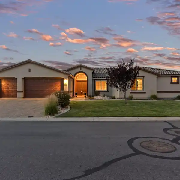 EXCEPTIONAL SINGLE-STORY RESIDENCE IN GATED SADDLE RIDGE