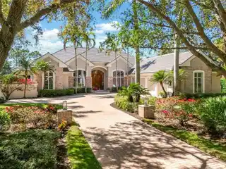 Custom Estate Home with Serene Golf and Lake Views