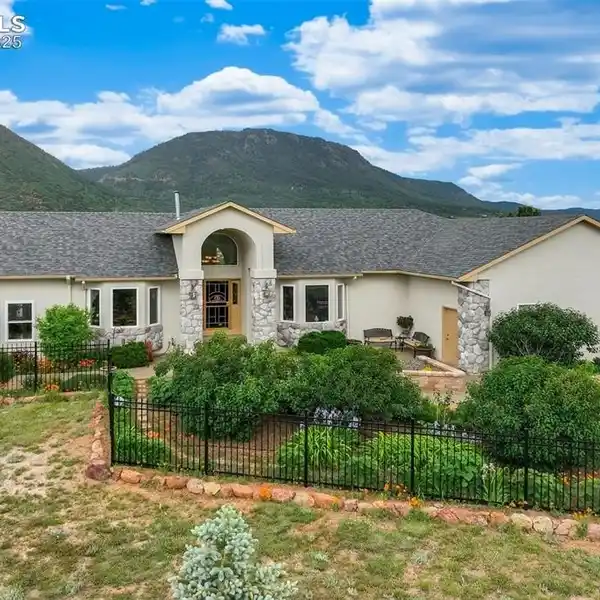 METICULOUSLY MAINTAINED RANCH HOME ON JUST OVER FIVE ACRES