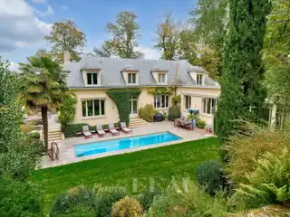 Prestigious Estate with Spa, Cinema, and Lush Grounds