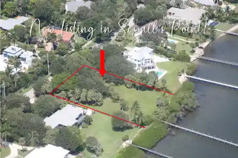 Oversized Waterfront Lot with Incredible Potential and Dock