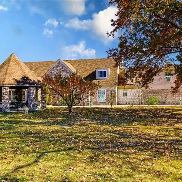 EXPANDED CUSTOM BUILT TUDOR STYLE CAPE