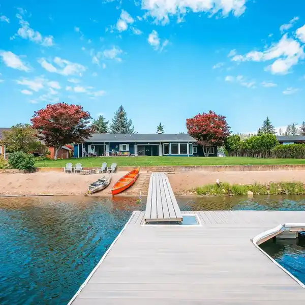 LAKEFRONT LIVING WITH A PRIVATE BEACH