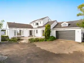 Rare Dual-Home Retreat on Massive Grounds