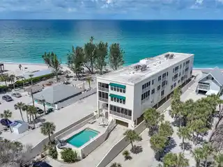 Secure Gated Condo Steps from Beach
