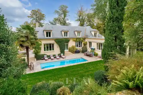 Prestigious Estate with Spa, Cinema, and Lush Grounds