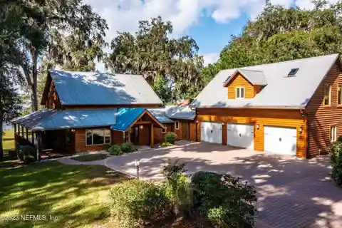 Elegant Riverfront Home on Double Lot