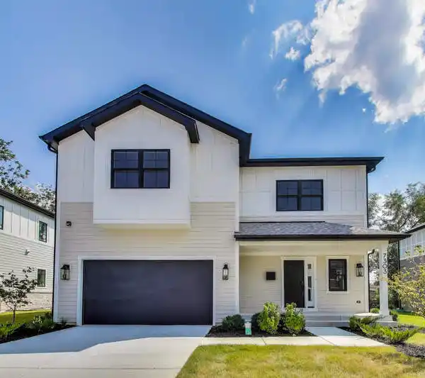 CHEF’S DREAM KITCHEN WITH WATERFALL ISLAND AND THERMADOR APPLIANCES
