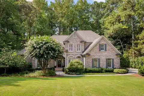 Timeless White Columns Home with Scenic Porch