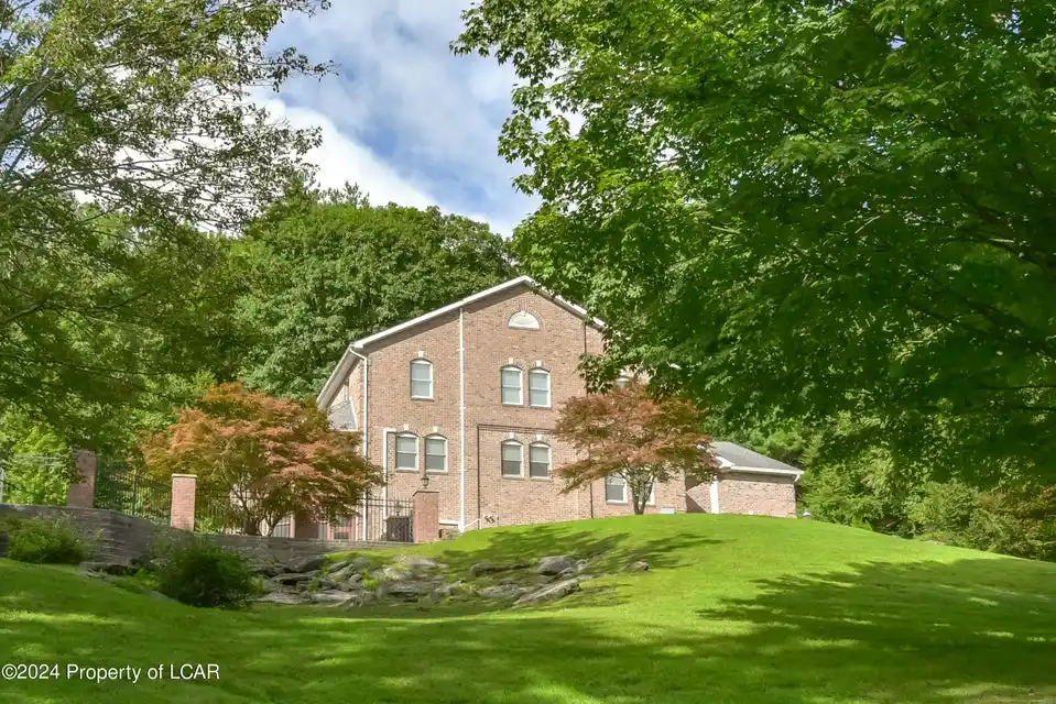 Spacious Brick Residence on over Four Acres