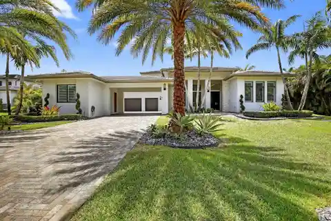 Impressive Two-Story Residence in Exclusive Plantation Acres