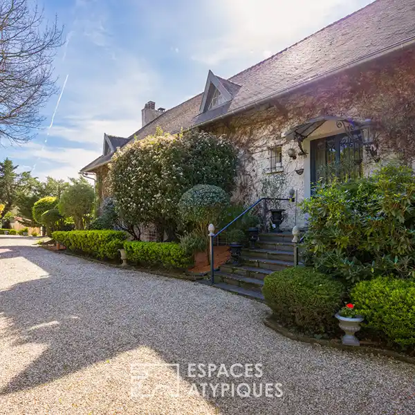 GRAND BOURGEOIS HOME WITH LUSH GARDENS