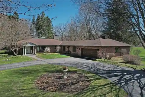 Stately Brick Ranch on over Seven Acres