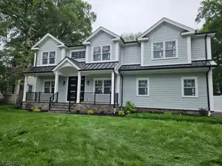 Porch-Perfect Living with Designer Interiors Throughout