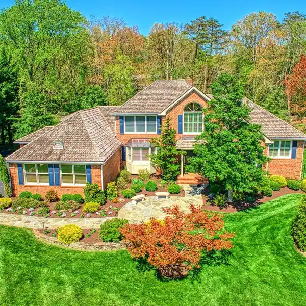 ELEGANT BRICK ESTATE WITH HEATED POOL & SPA