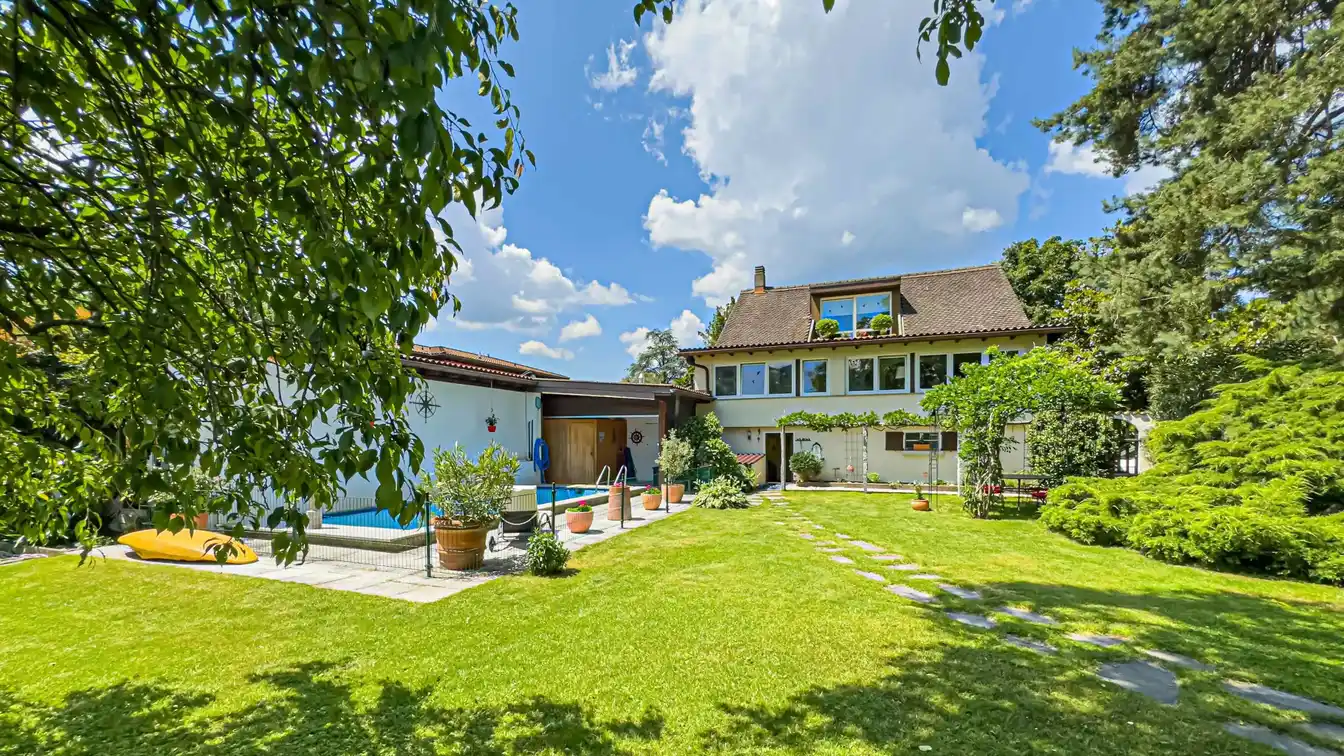 Villa Nestled in Lush Greenery Featuring a Swimming Pool and Proximity to Lake Lugano