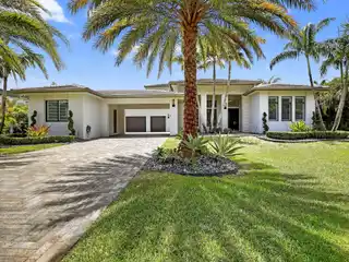Impressive Two-Story Residence in Exclusive Plantation Acres