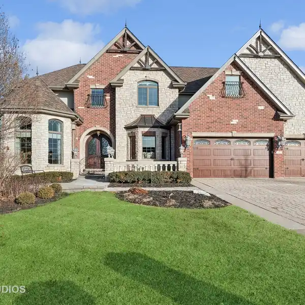 EXQUISITE CUSTOM HOME WITH EXCEPTIONAL CRAFTSMANSHIP