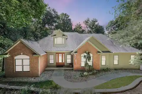 Custom Ranch Home on a Private Wooded Lot