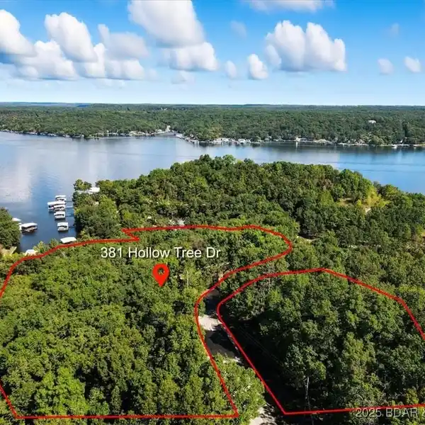 BEAUTIFUL LOG HOME WITH SHOP ON NINE ACRES