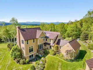 Panoramic Mountain Views with Elegant Living