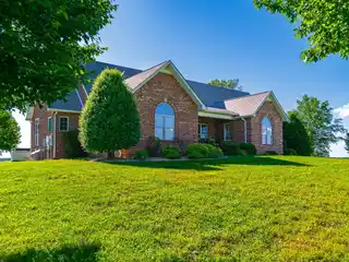 Updated Home with Gorgeous Hilltop Views on 33 Acres