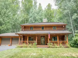 Elegant Log Home Along the Bigwood River
