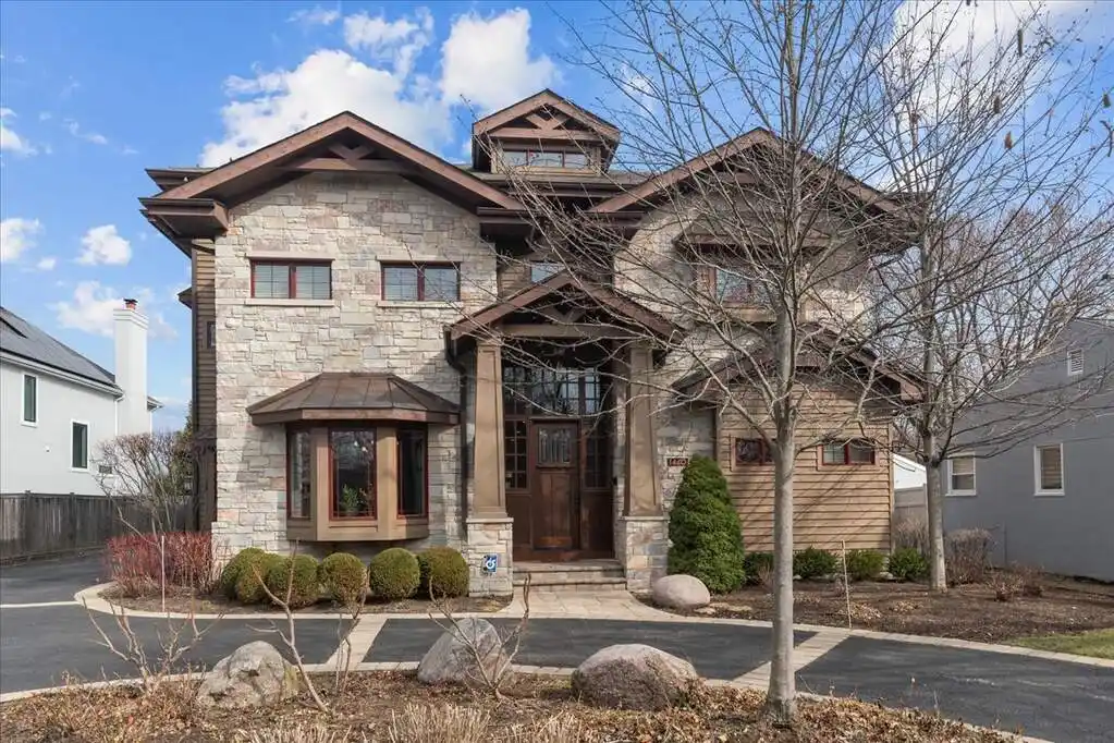 Custom Home Backing to Woodland Park