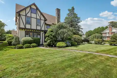 Expansive Center Hall Tudor Home