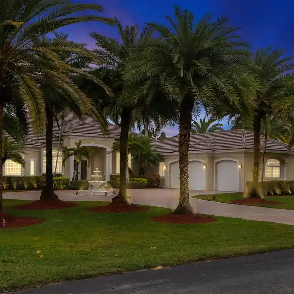 CUSTOM HOME ON A CORNER LOT IN EXCLUSIVE CRYSTAL GROVES ESTATES
