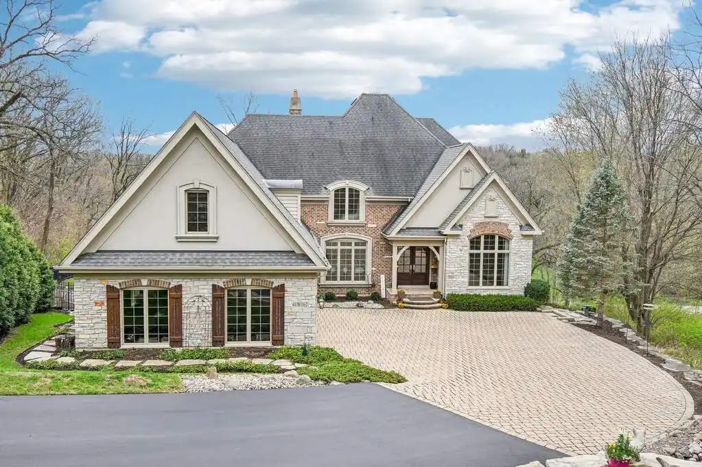 Exquisite Brick and Stone Custom Home