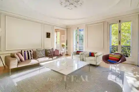 Sunlit Residence with Continuous Balcony Elegance