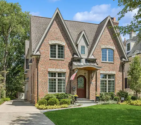 CUSTOM BRICK HOME WITH A SPECTACULAR LAYOUT