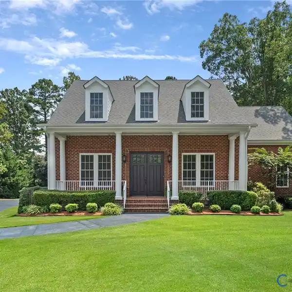 ALL-BRICK HOME ON A RARE ONE-ACRE LOT